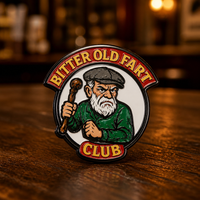 Bitter Old Fart Club soft enamel pin — AI product shot