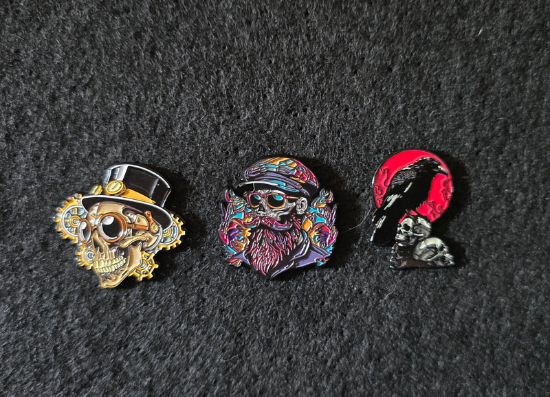 Sold out skull series!  From the Pinheads Vault three sold out pins.  Steampunk, Pinhead Dude and Bad Moon Rising!